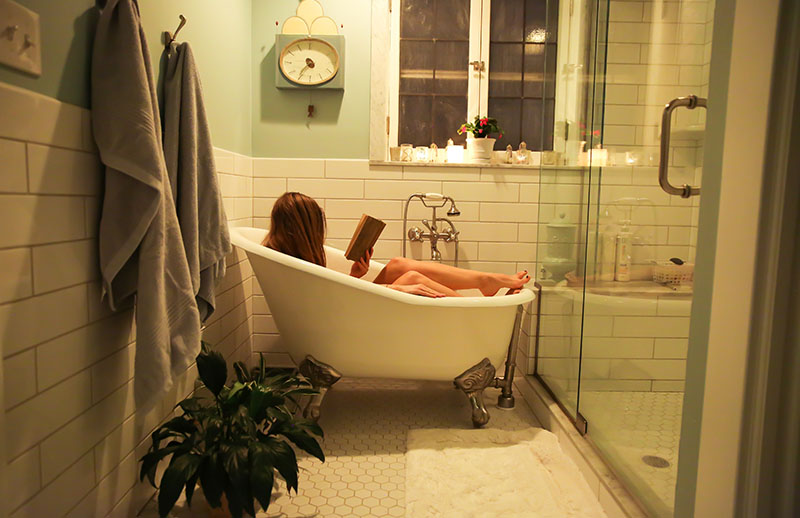 taking a bath is on the top of the list for self-care tips for female travelers